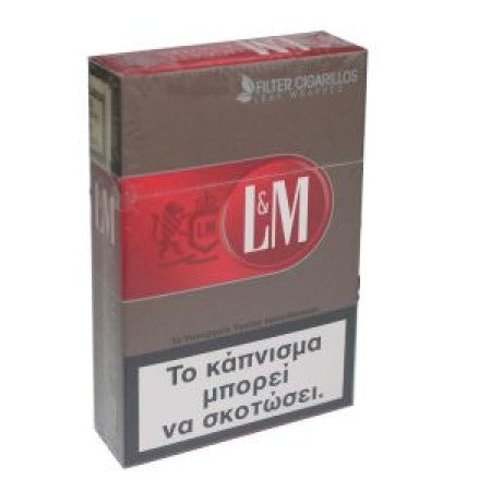 A pack of L&M Filter Cigarettes, featuring a brown and red design with a prominent white warning label in Greek at the bottom.