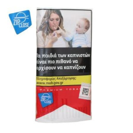 A roll of premium tobacco cigarette packs with a prominent health warning in Greek, featuring a photo of a mother and child, and blue 'ZIP CLOSE' filter stickers on a white background.